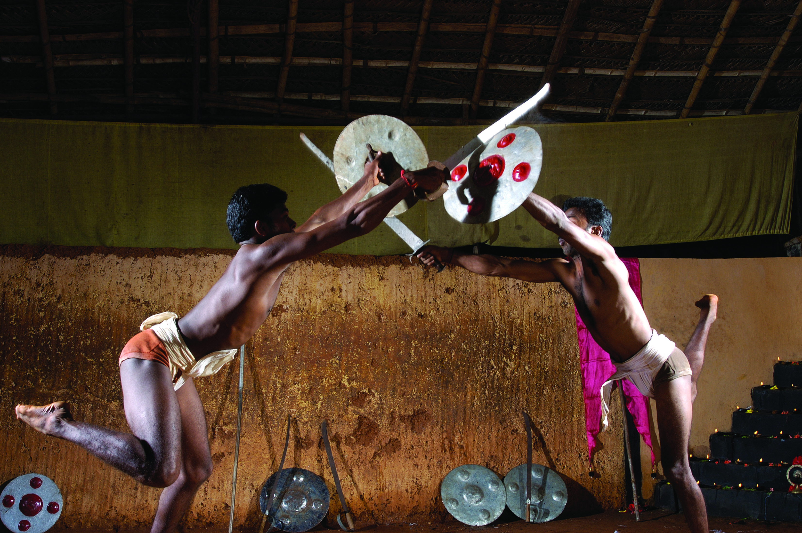 Kalaripayattu ancient martial art Kerala -- the world's oldest martial art form practised in traditional kalari training halls of North Kerala Malabar coast