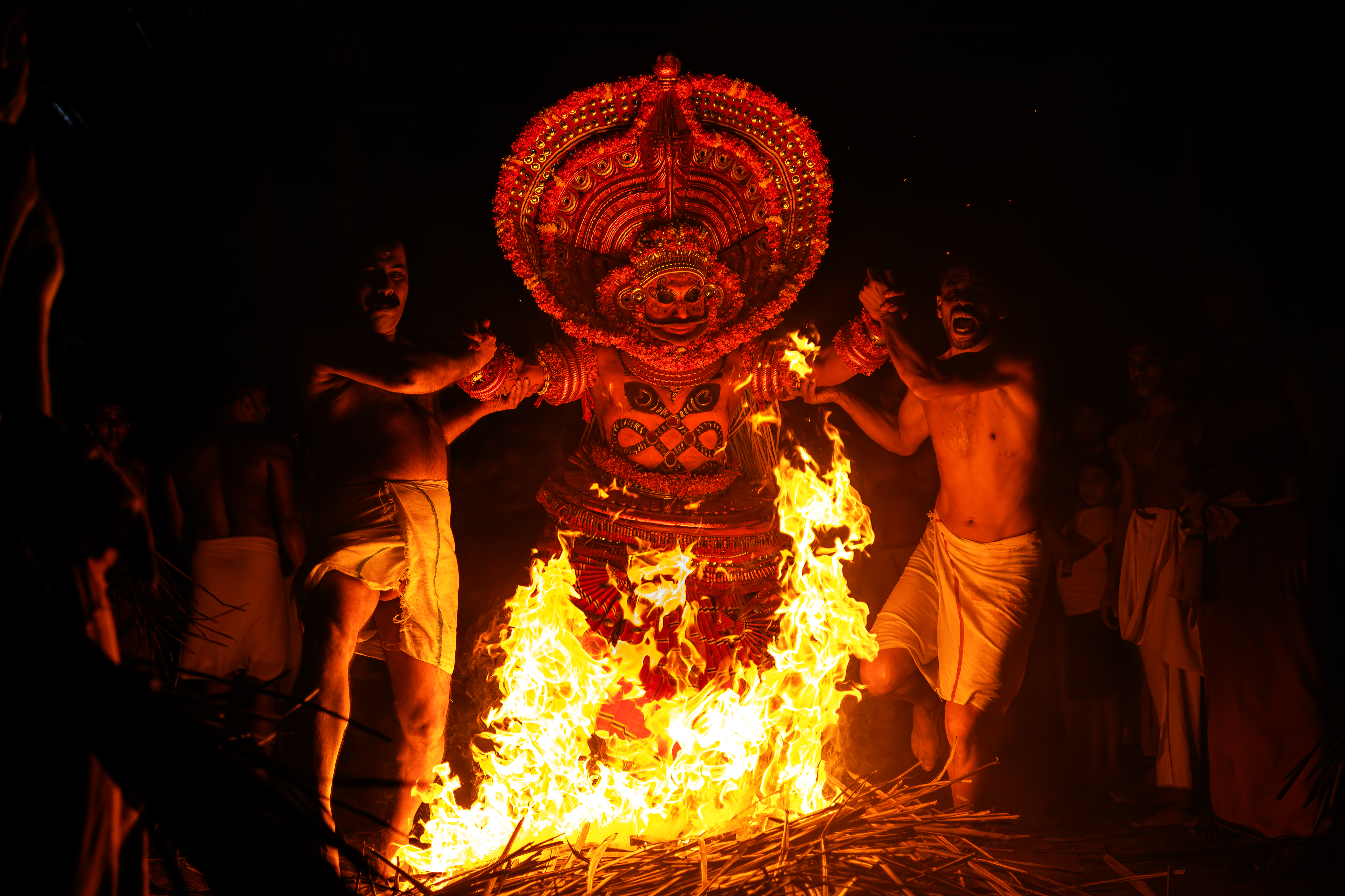 Theyyam ritual performance Kannur North Kerala -- deity possession trance dance ancient art form Malabar coast